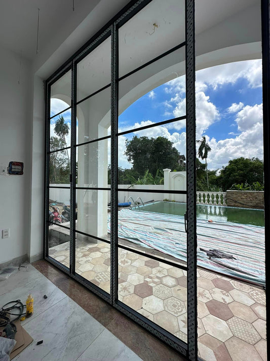Iron vs Aluminum Front Doors in Houston: Which Is Better for Heat, Style, and Maintenance?