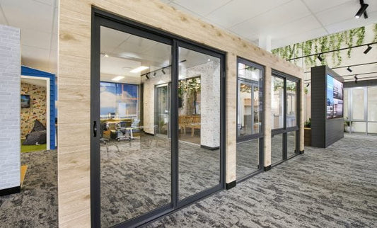 Black aluminum sliding patio doors for a modern Texas home