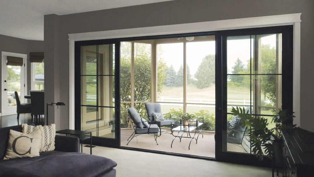 Black aluminum sliding patio doors for a modern home
