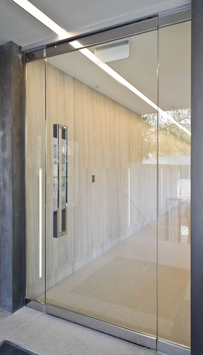 Frameless commercial glass single door office retail Texas