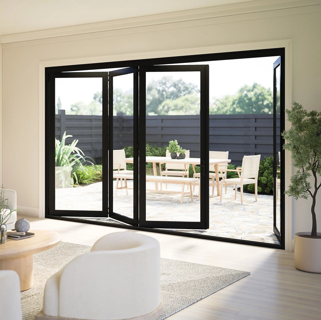 Black bi-fold patio doors opening to an outdoor living space