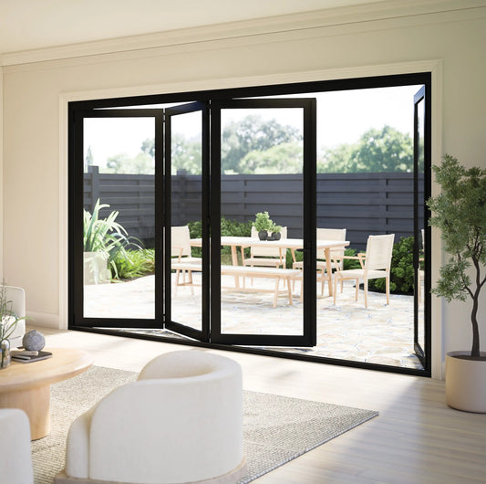 Black bi-fold patio doors opening to an outdoor living space