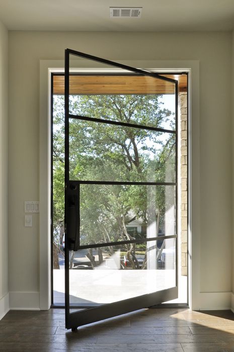Transform Your Entrance with a Custom Pivot Door from Texas Glass Door